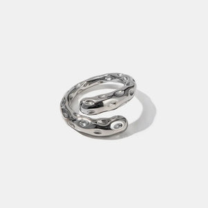 Sculpted silver bubble ring with textured surface detail.
