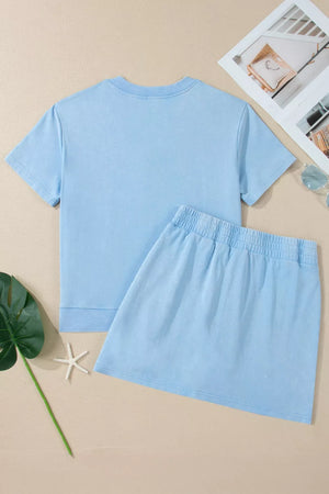 Light blue cotton V-neck top and elastic waist skort set