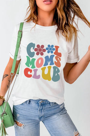 White graphic tee with colorful "Cool Moms Club" text and flower details