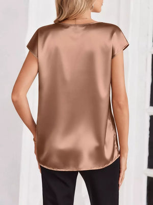 Champagne satin V-neck blouse with short sleeves and a relaxed fit.