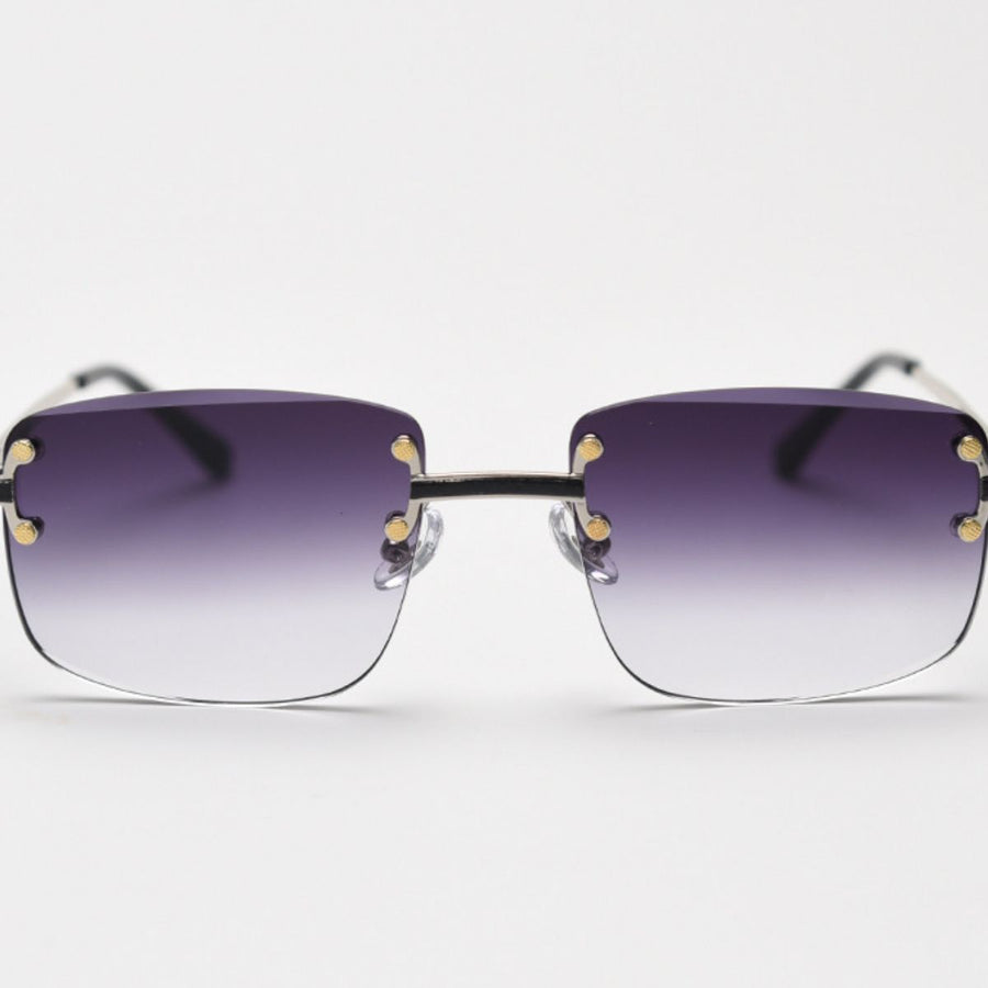 Rimless gradient tinted sunglasses with purple to clear lenses and gold accents.
