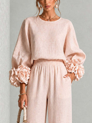 Black two-piece set with hip-length (top), full-length (pants) and pullover (top), elastic (pants)
