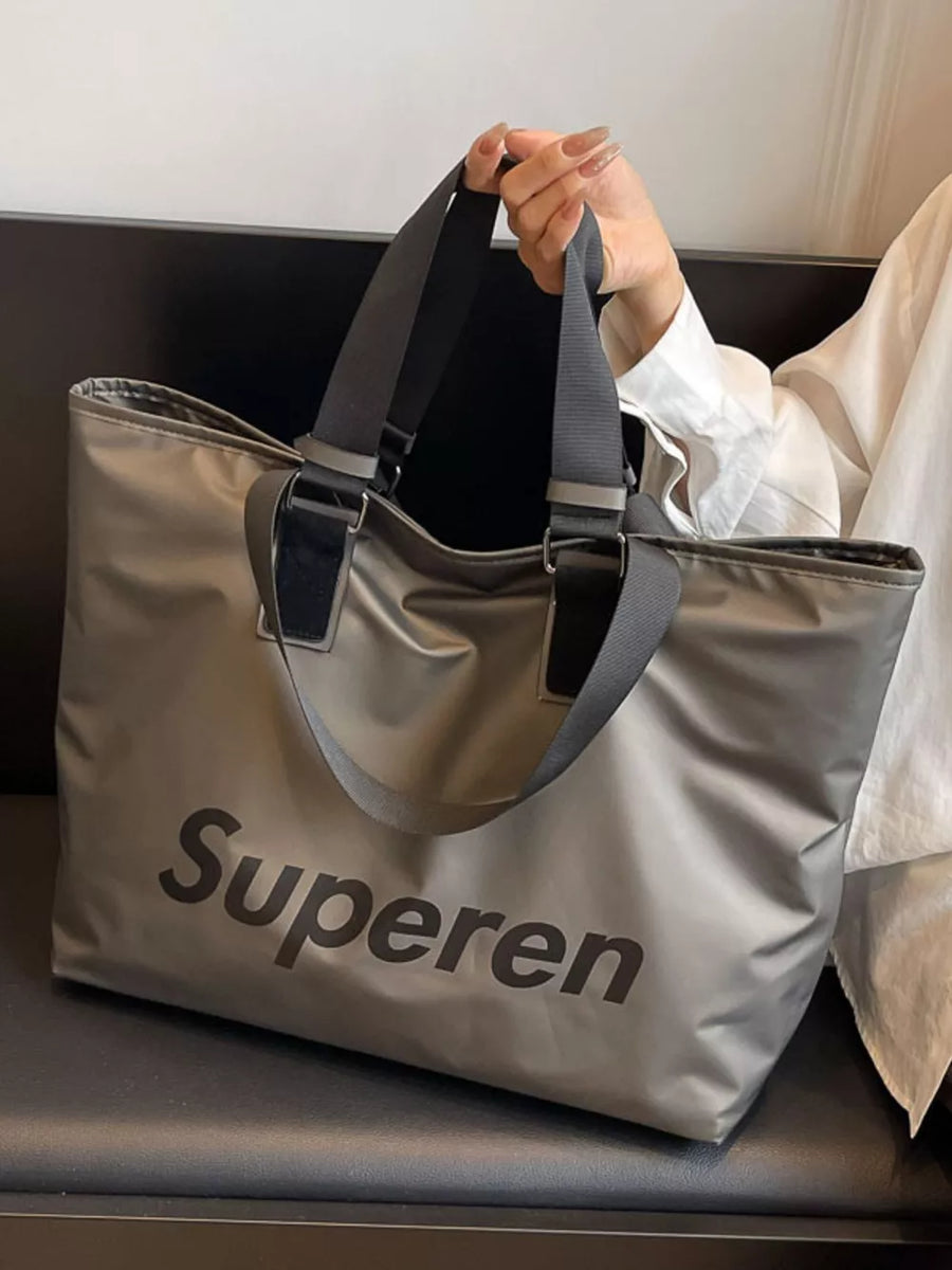 Spacious grey Oxford cloth travel shoulder bag with black "Superen" logo and dual straps.