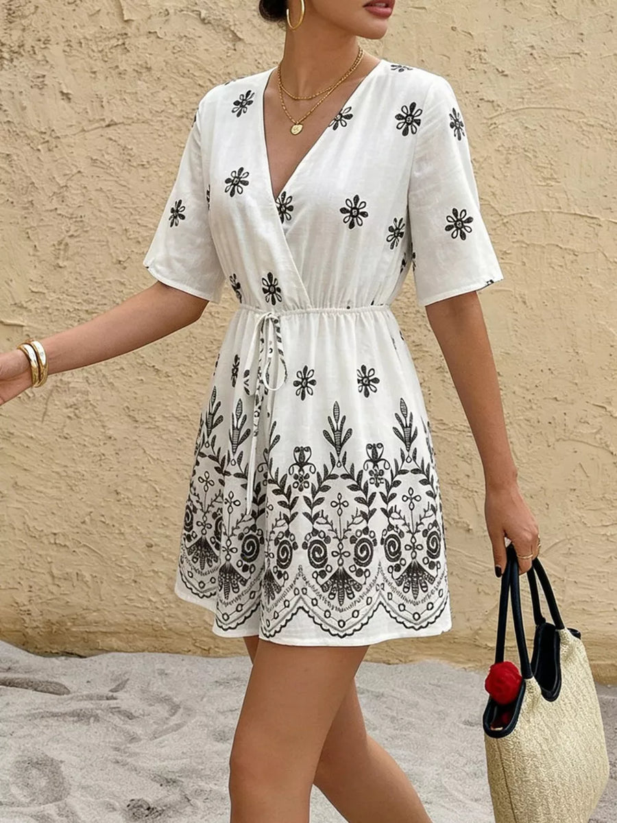 Printed Surplice Half Sleeve Romper in White