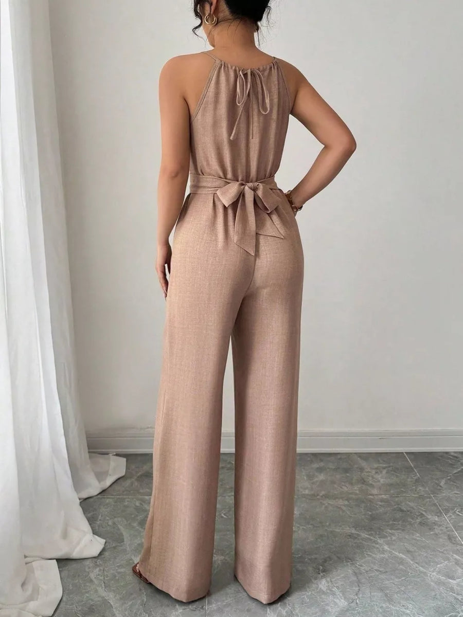 100% polyester Care instructions: Machine wash cold jumpsuit in Black with flared silhouette