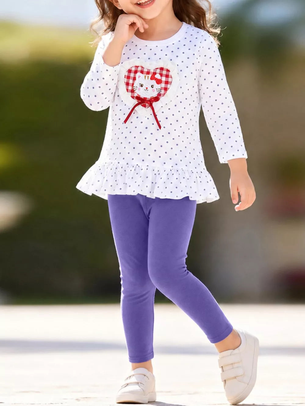 white peplum top with polka dot and round neck