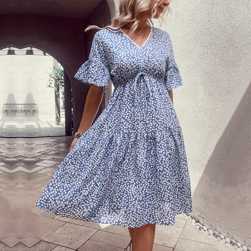 Light blue ditsy floral midi dress with tiered skirt and tie waist
