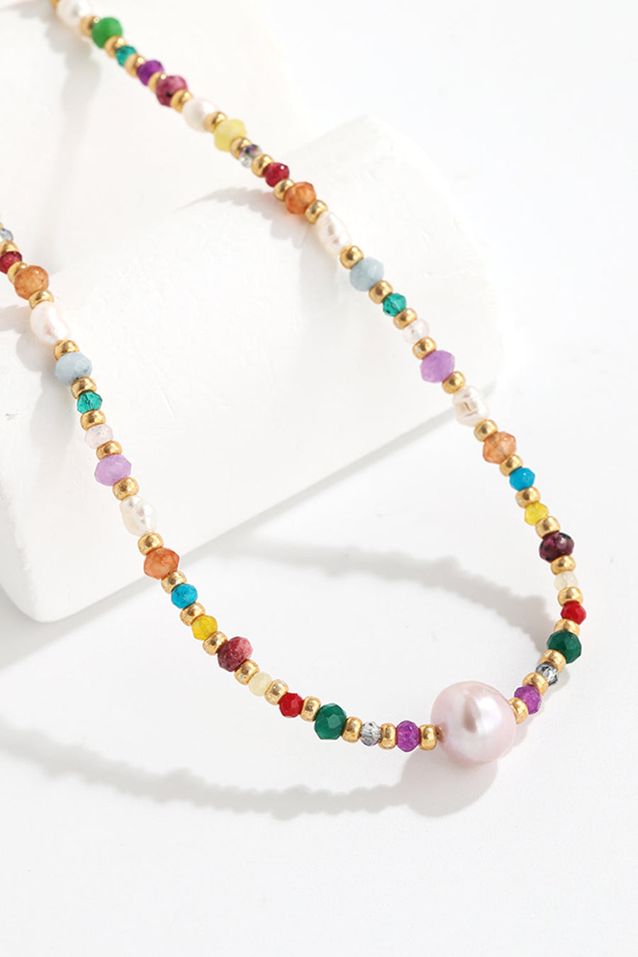 Multicolor beaded gemstone and pearl necklace with gold accents