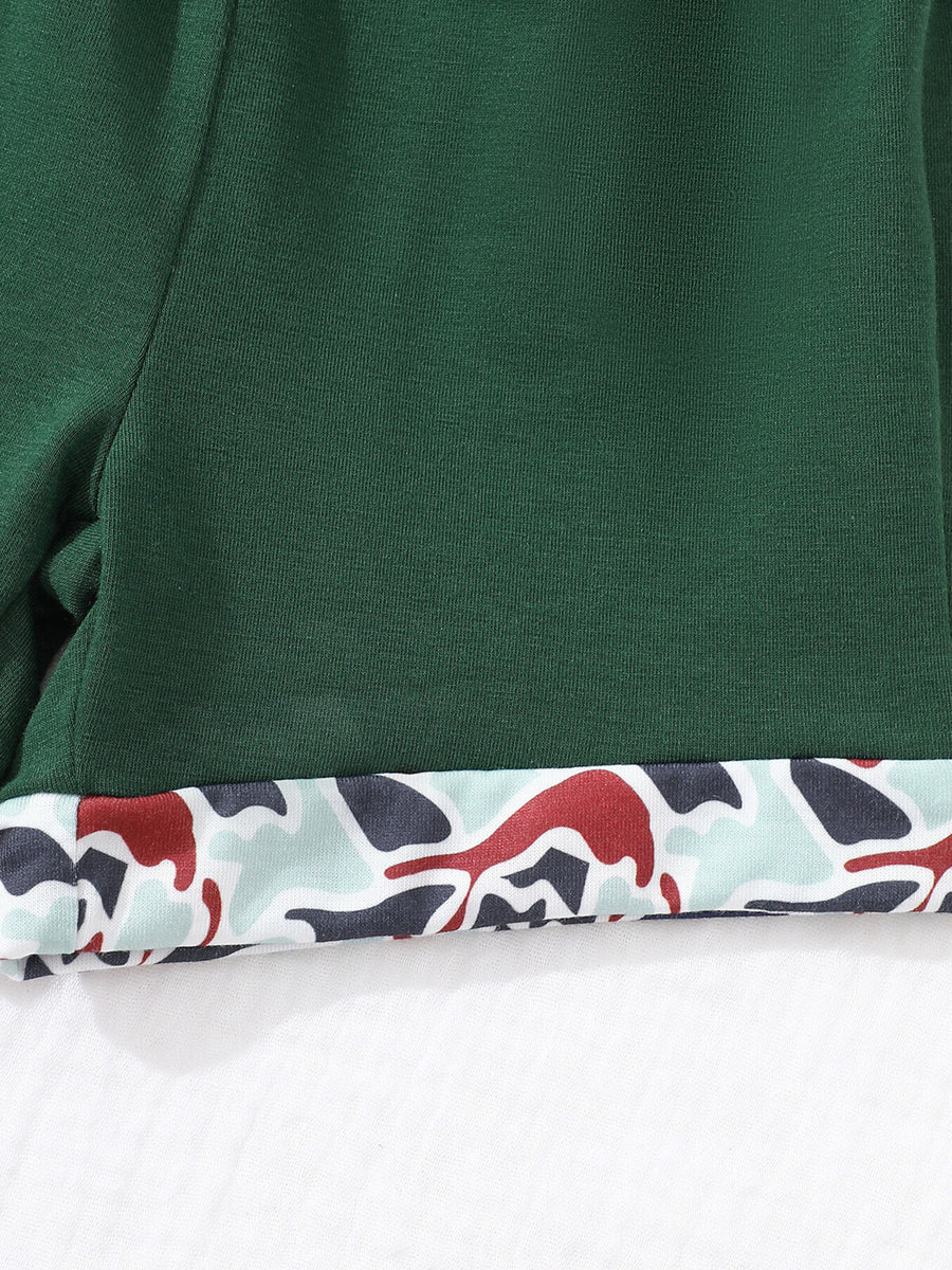 Dark green baby polo and shorts set with camouflage trim detail