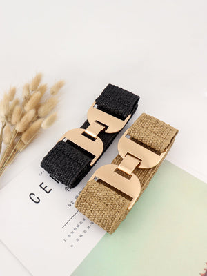 Textured raffia belts in black and khaki with gold-tone buckle details.