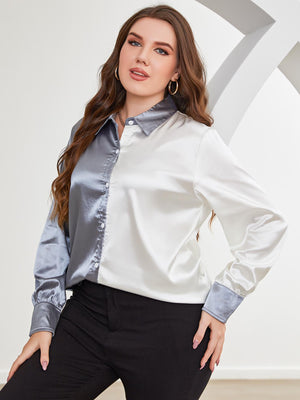 Satin split-tone button-down blouse in light blue and white with a collared neckline and long sleeves.