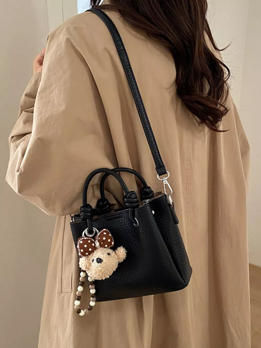 black crossbody bag with small and zip
