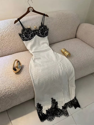 100% polyester Care instructions: Machine wash cold maxi dress in White with slim silhouette