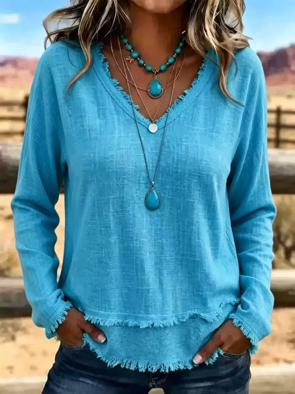 V-neck Long Sleeve Blouse With Frayed Hem in Dark Blue with raw hem