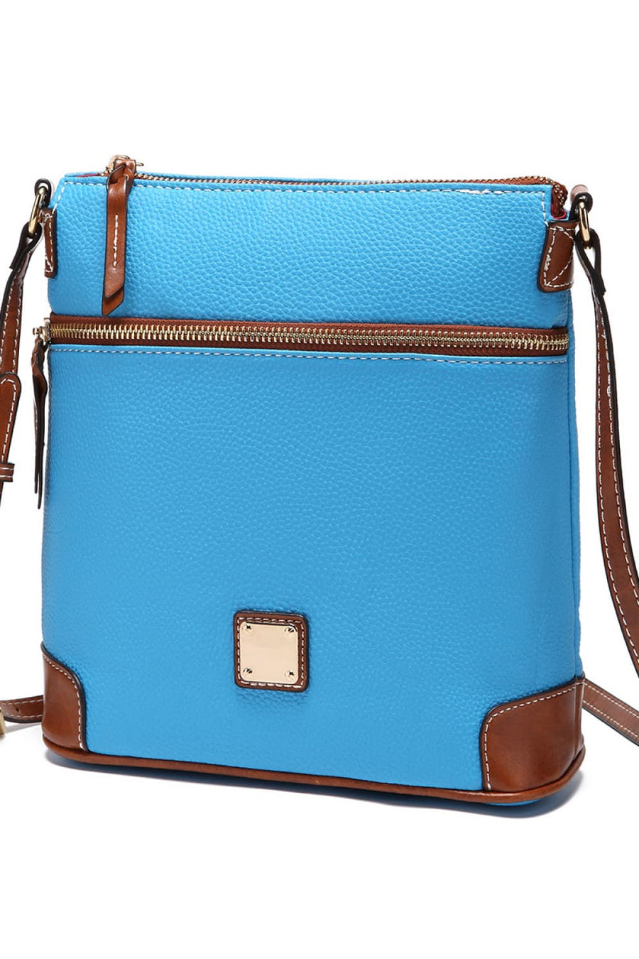 Pastel blue leather crossbody bag with brown trim and gold hardware