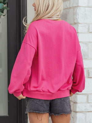 Pink crew neck cotton sweatshirt with embroidered lucky clover detail