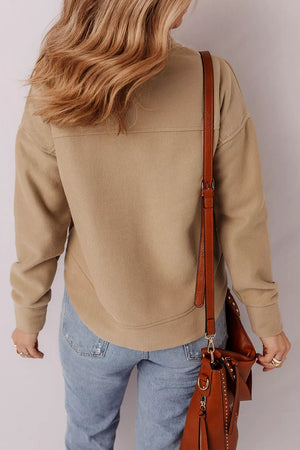 50% polyester, 50% cotton Care instructions: Machine wash cold sweatshirt in camel with relaxed silhouette