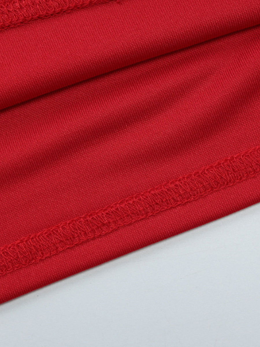 Red halter neck cami top with adjustable ties and deep v-neck detail.