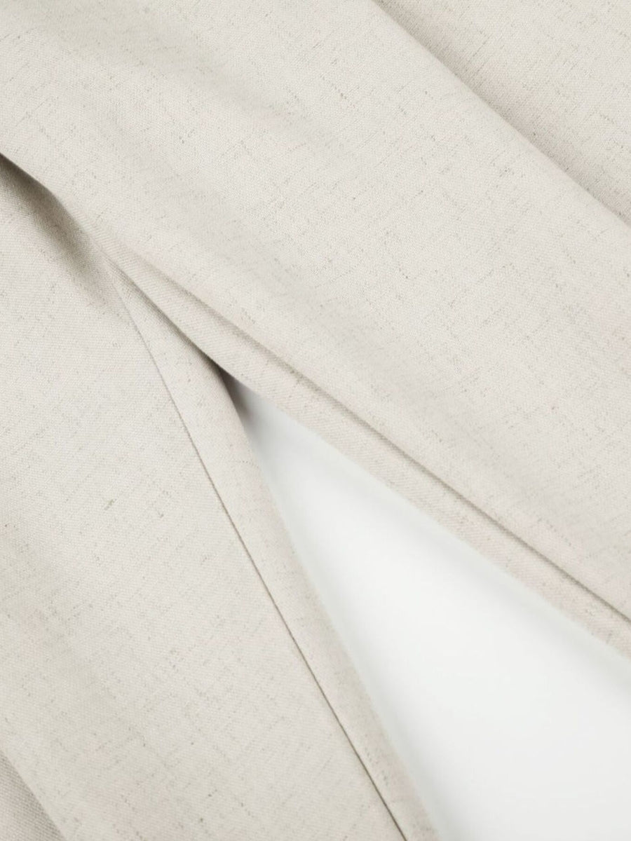 wide-leg pants in cream with buttoned and full-length
