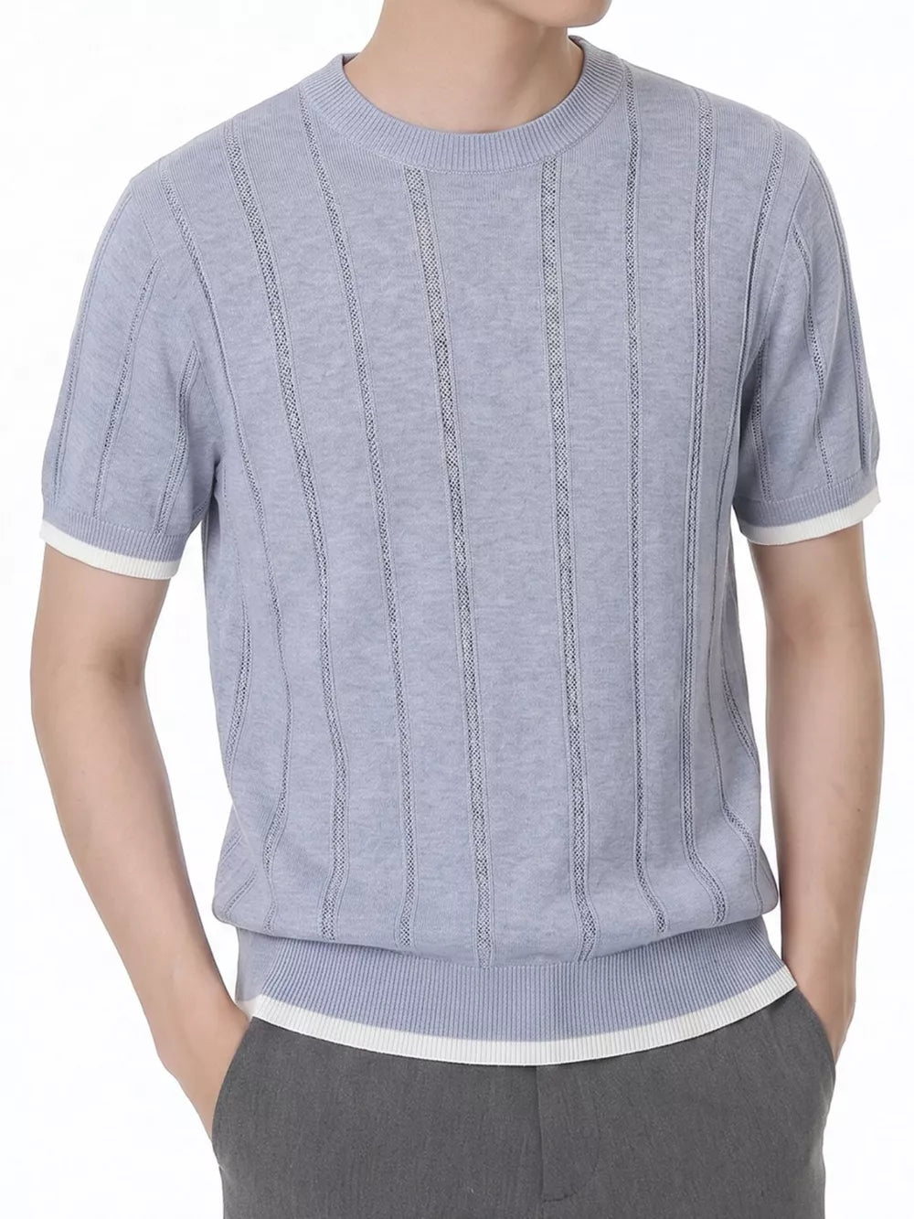 Blue knit t-shirt with vertical openwork stripes and contrast white trim at sleeves and hem.