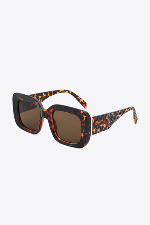 Tortoiseshell rectangular sunglasses with textured arms and brown lenses.