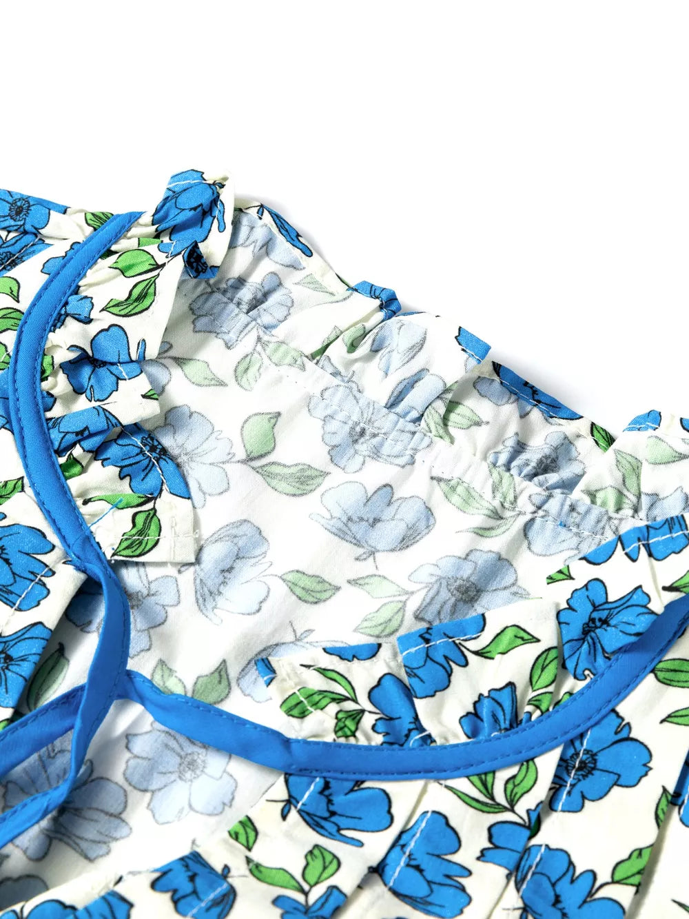 Floral ruffle sleeve tie-neck shirt with blue floral print and contrast trim.