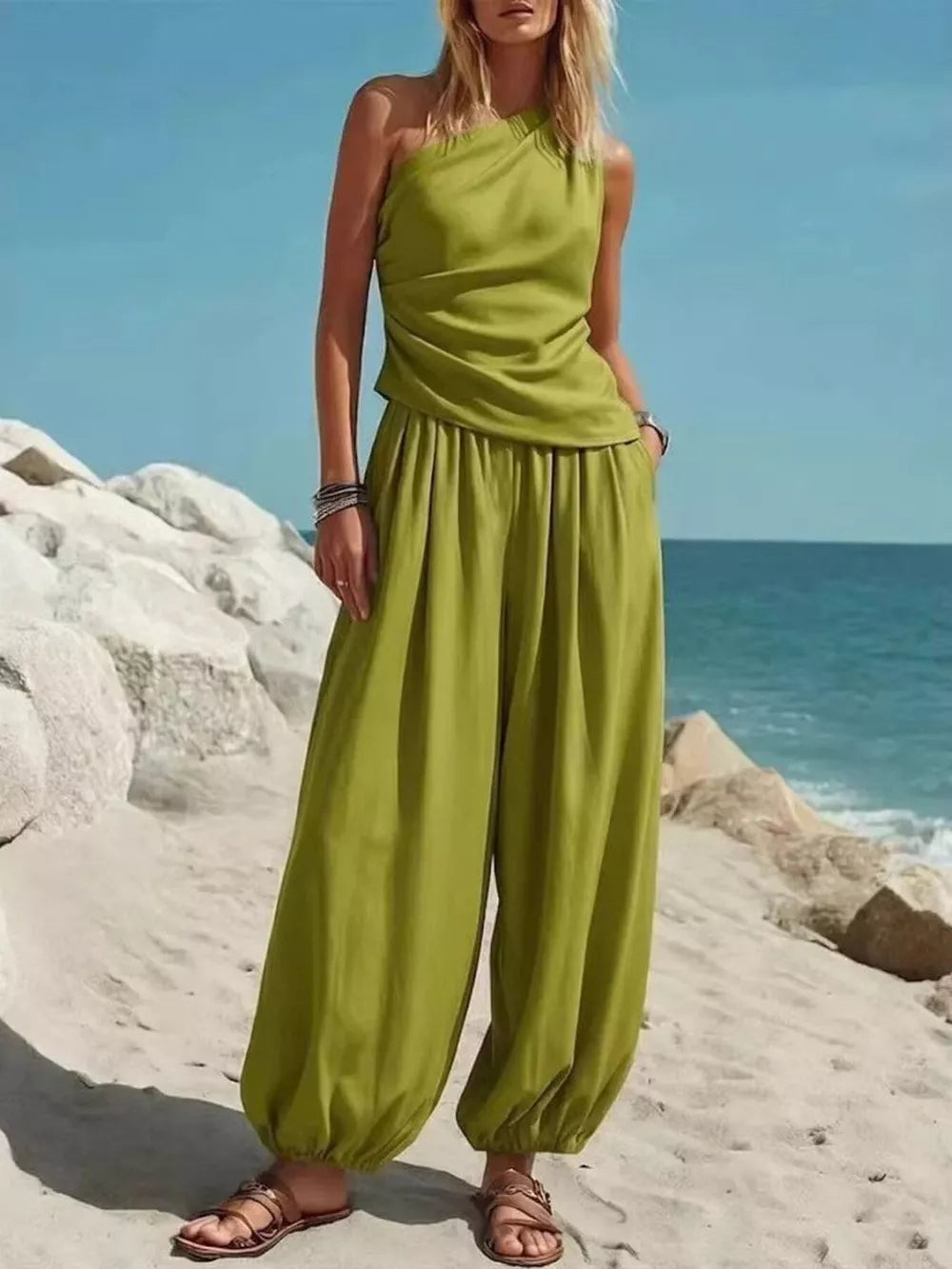 Green one-shoulder top and wide-leg pants set with ruched detail on top and gathered ankles