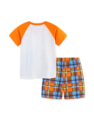 Baby outfit: white cotton tee with orange raglan sleeves and plaid shorts.
