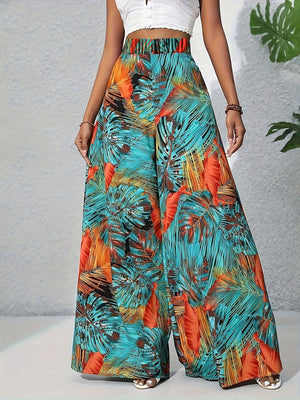 Tropical print wide leg pants with elastic waistband and flowy silhouette.