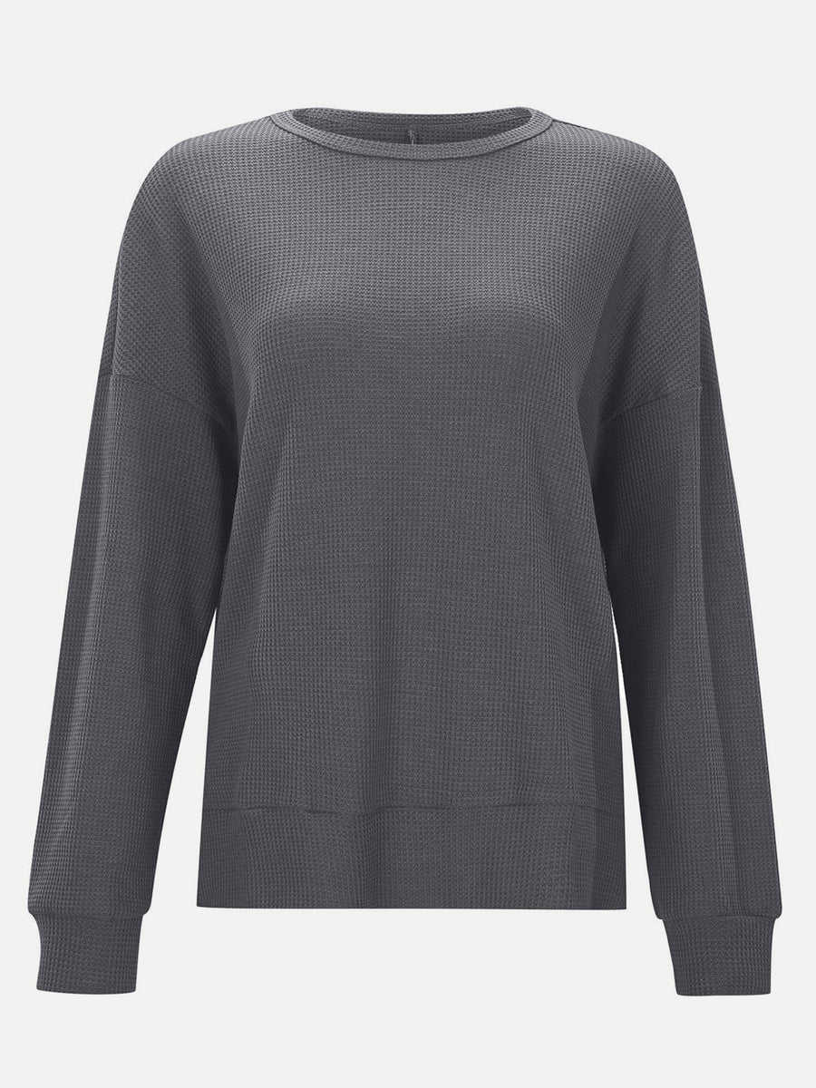 Dark Gray waffle knit crewneck top with relaxed fit and long sleeves.