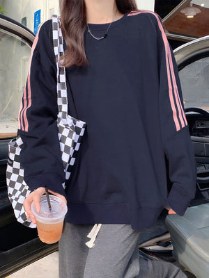95% polyester, 5% spandex Care instructions: Machine wash cold sweatshirt in Navy with relaxed silhouette