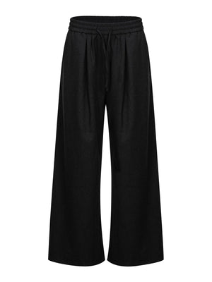 wide-leg pants in black featuring drawstring waist and wide-leg fit