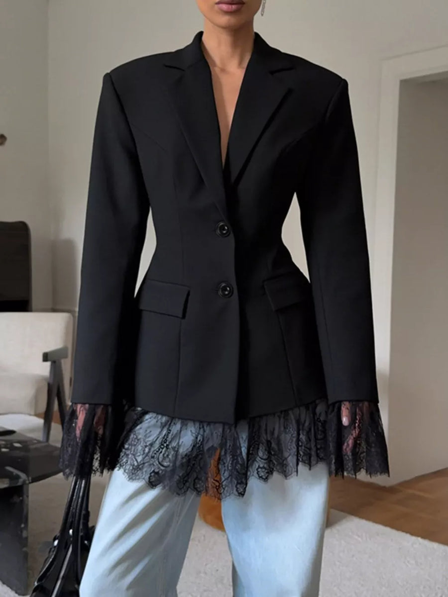 Black blazer with ruffled hem and long sleeve