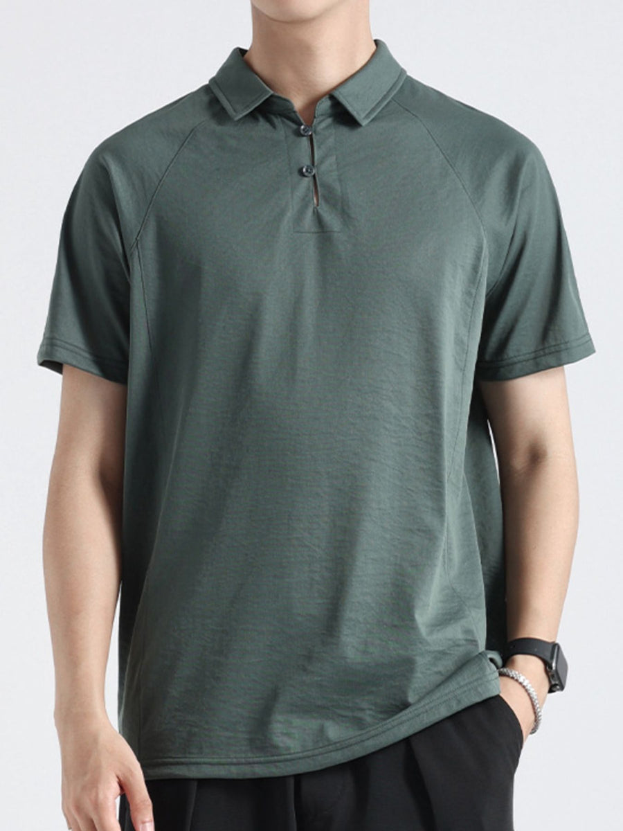 Dark green cotton blend polo shirt with short sleeves and a two-button placket.