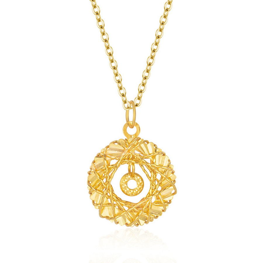 Gold-plated sterling pendant necklace with intricate circular design and small inner circle charm.