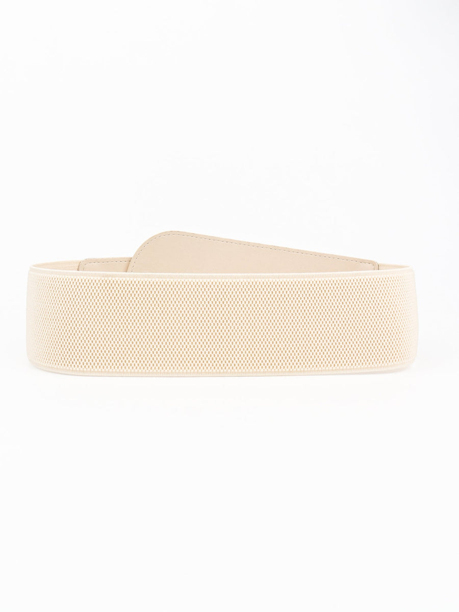 Cream elastic waist belt with sculpted faux leather overlay and gold buckle detail