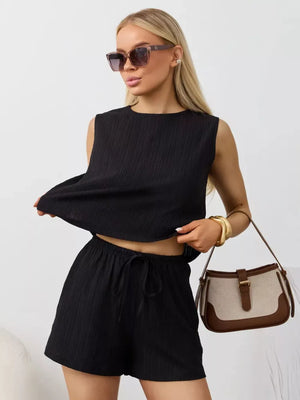 Black textured cotton tank and drawstring shorts set with a relaxed fit.
