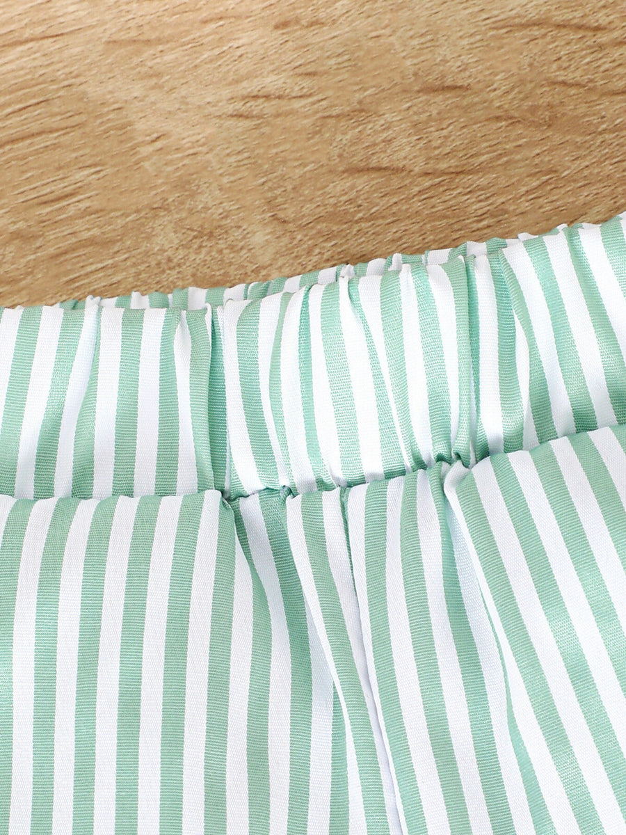 Baby shorts with green and white stripes, elastic waistband, cotton fabric.
