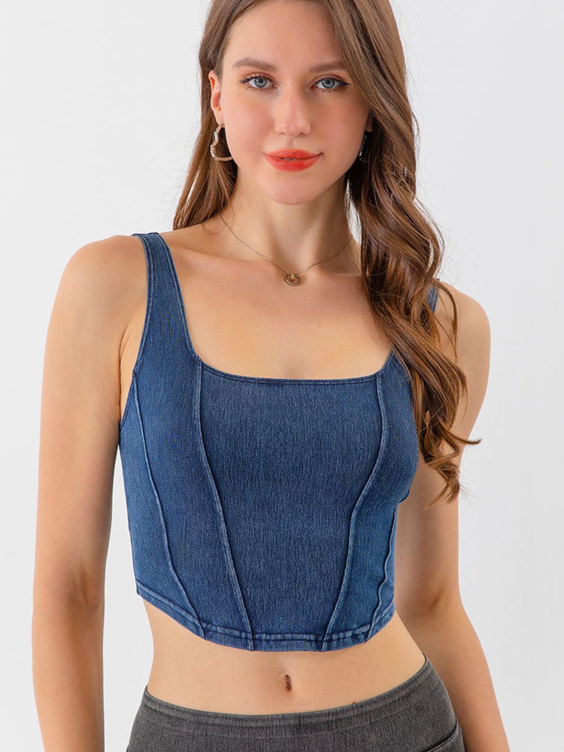 Denim corset crop top with square neckline and seam details in Dusty Blue.