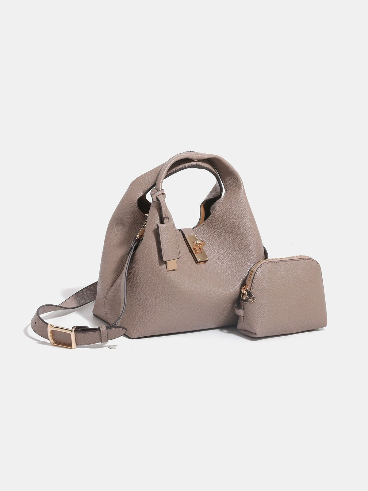 crossbody bag in taupe featuring adjustable strap and relaxed fit