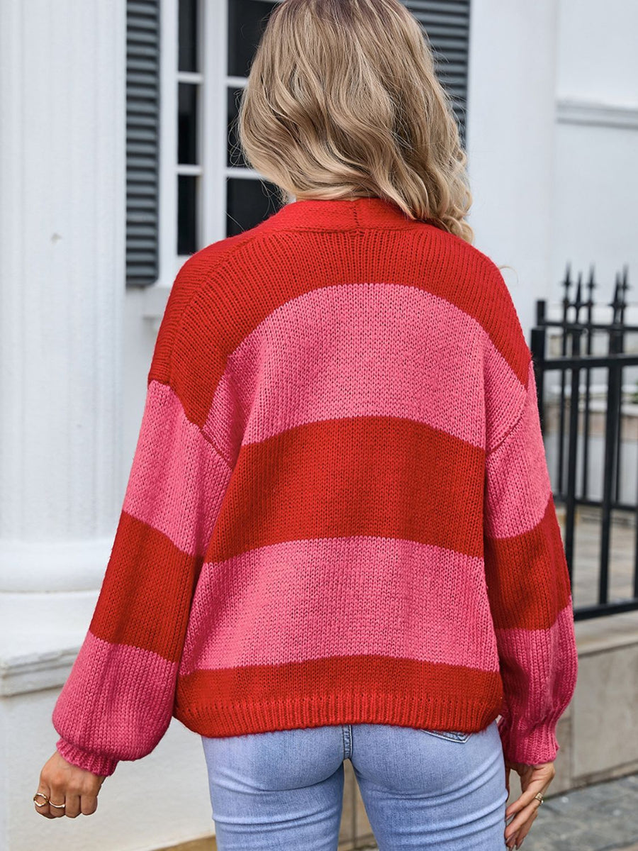 Colorblock balloon sleeve knit cardigan in red and pink stripes, acrylic material.