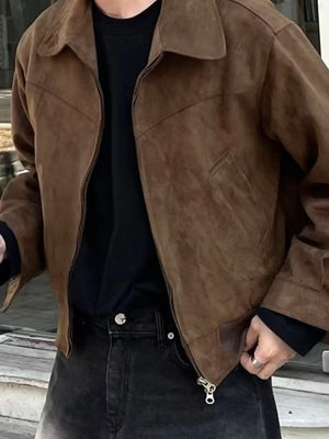 Brown suede zip-up jacket with a collar and chest pocket detail.