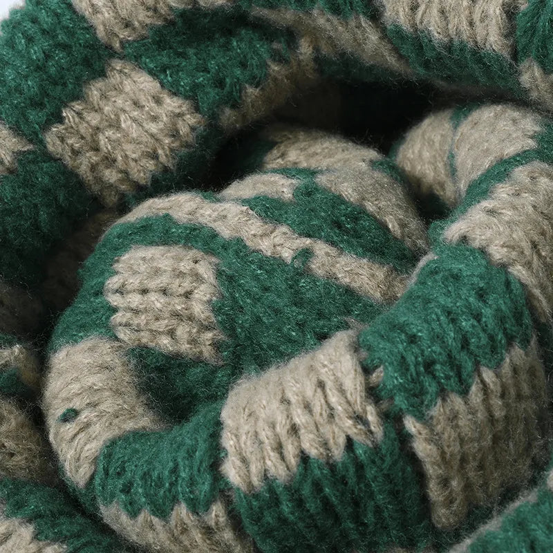 Checkerboard knit beanie in dark green and khaki.
