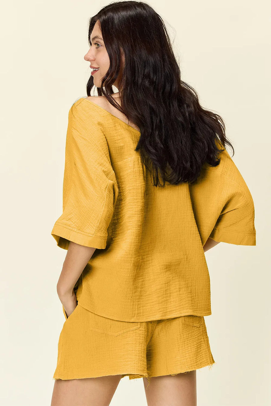Gold textured cotton half sleeve top and drawstring shorts set with frayed hem shorts.