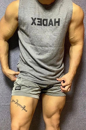 Gray muscle tank top with reversed black logo detail