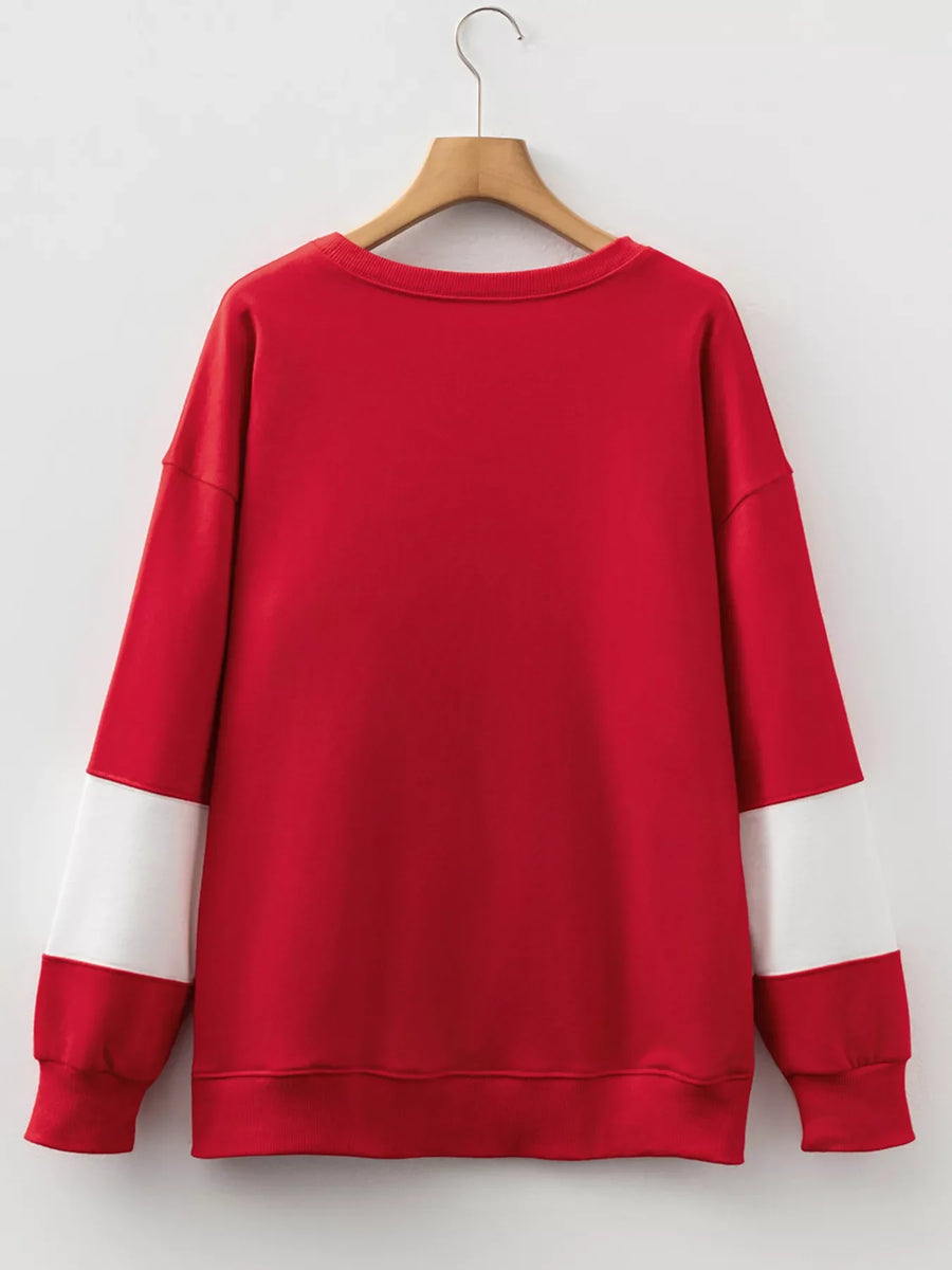 Scarlet sweatshirt with white sleeve bands and drop shoulders.