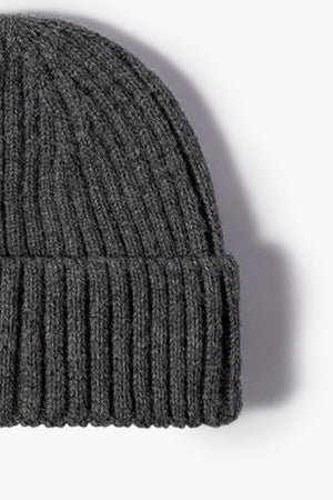 Chunky ribbed knit beanie in dark gray acrylic with a cuffed hem.