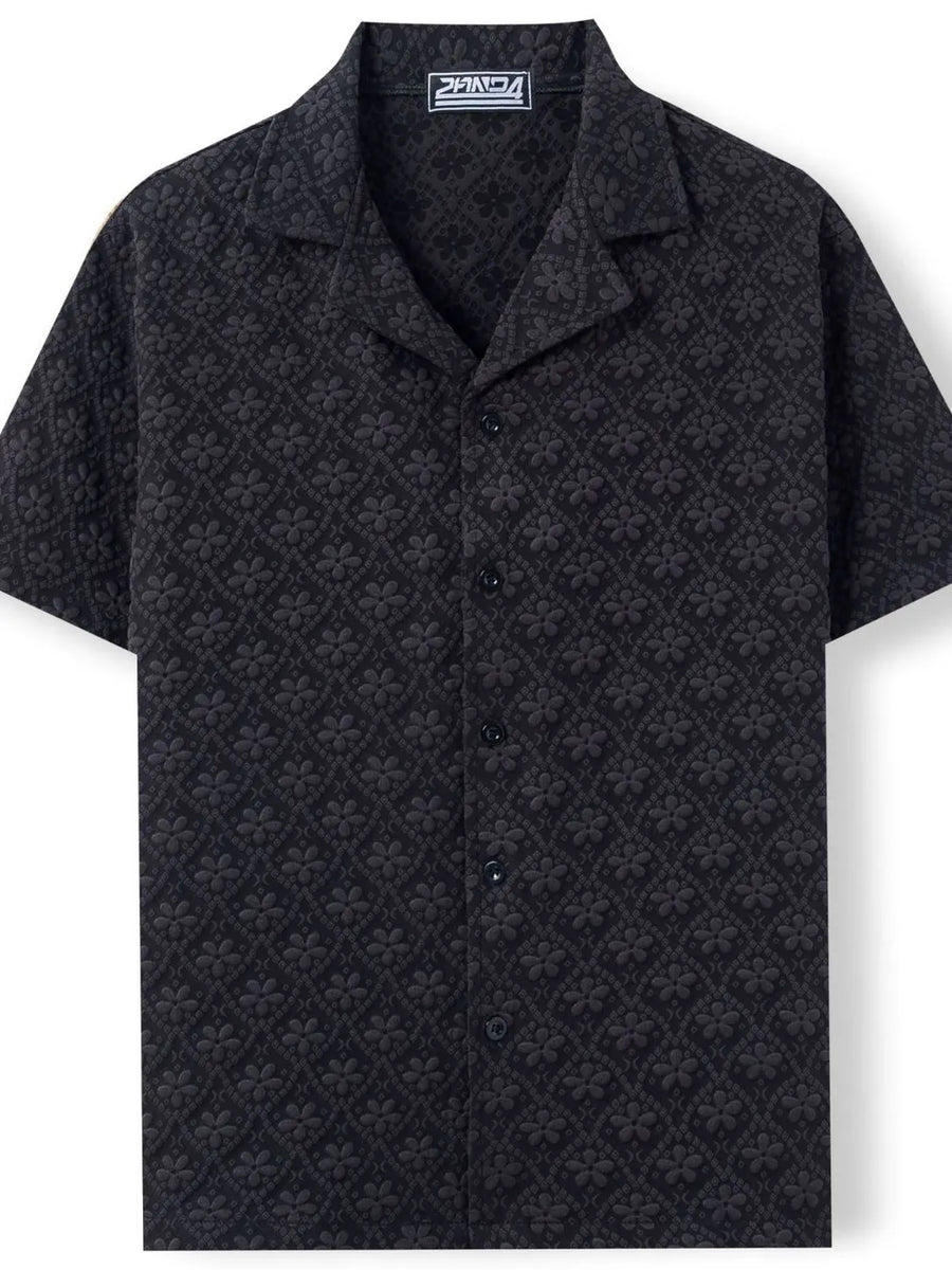 Black embossed floral camp collar shirt with short sleeves and button front.