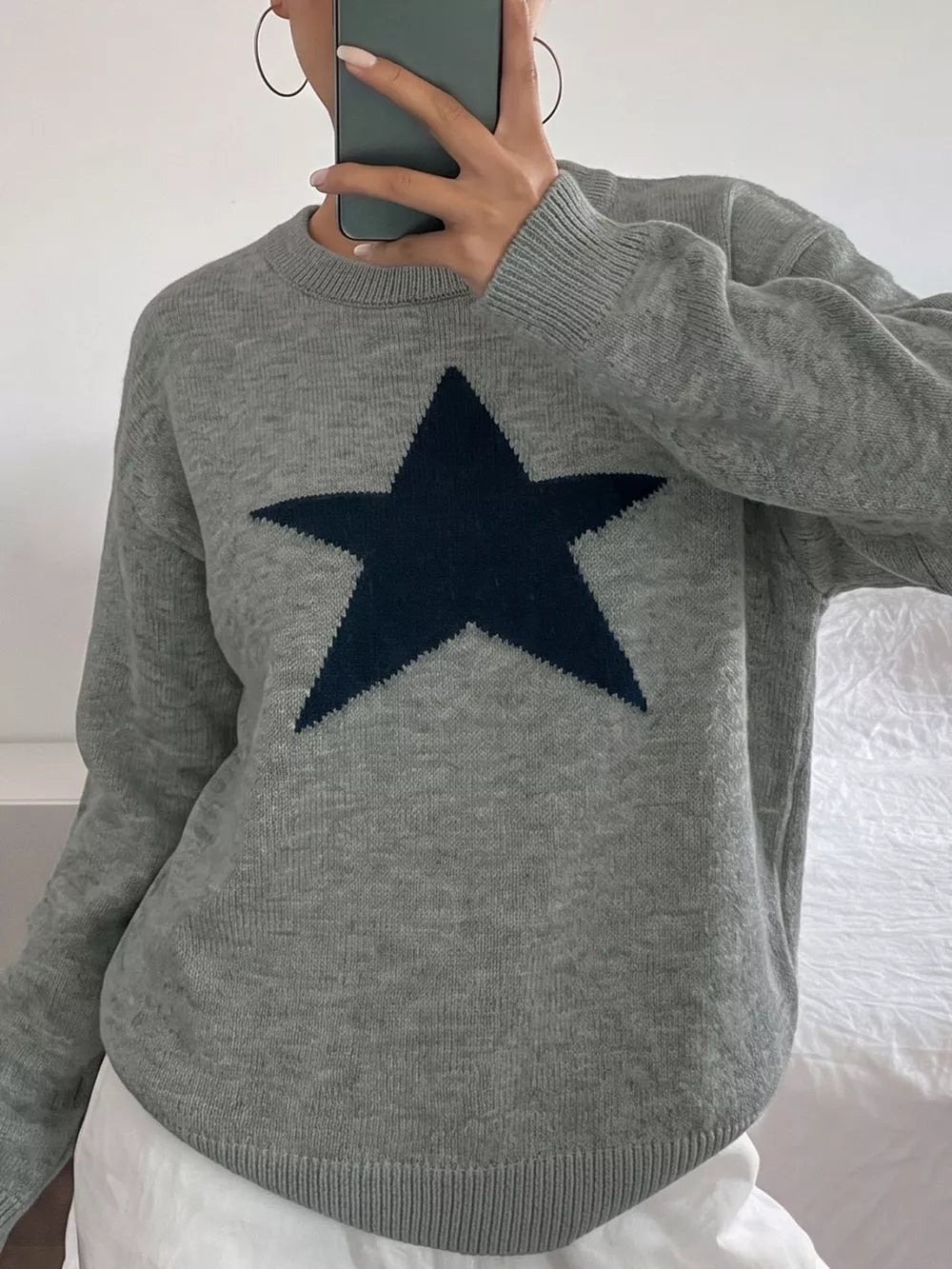 light gray pullover sweater with hip-length and pullover