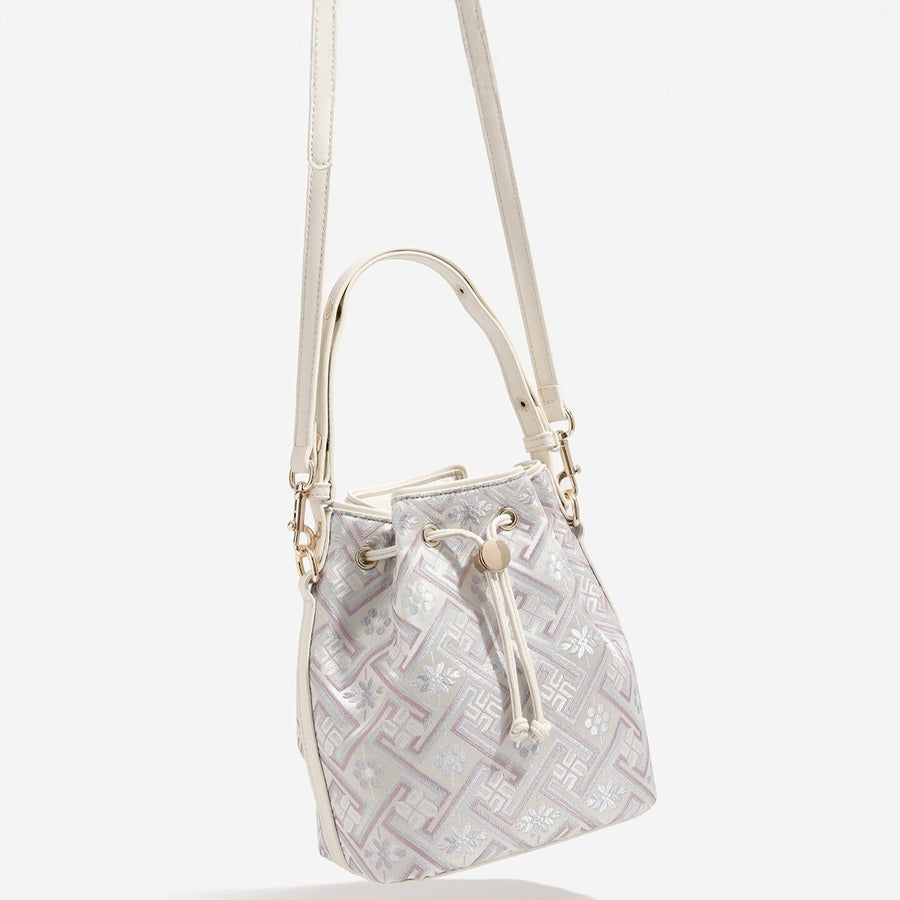 crossbody bag featuring geometric in cream with PU Leather Imported Size &amp texture